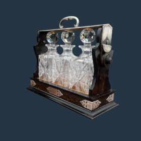 A Late Victorian Period Coromandel And Silver Plated Tantalus