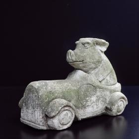 Vintage Reconstituted Stone Garden Pig in a Racing Car