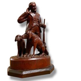 Early 20th Century Carved Hunter and Hounds