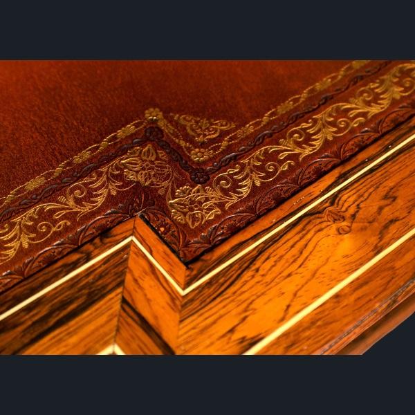 An exhibition quality Victorian Period rosewood inlaid pedestal desk