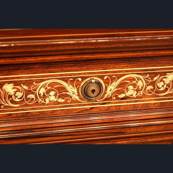 An exhibition quality Victorian Period rosewood inlaid pedestal desk