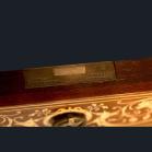 An exhibition quality Victorian Period rosewood inlaid pedestal desk